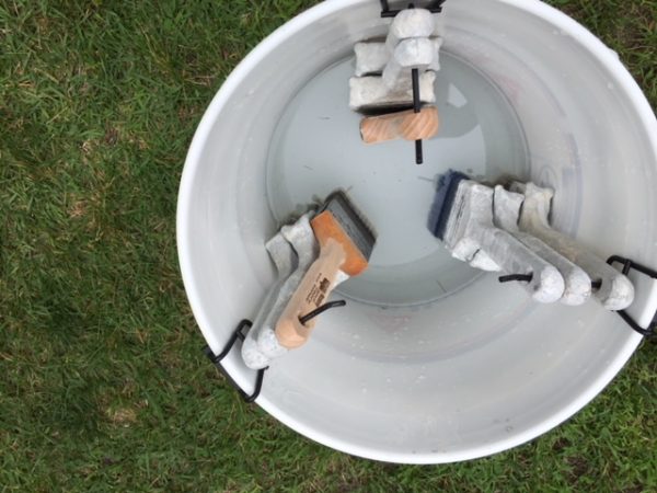 5 gallon bucket with water paint brush hangers